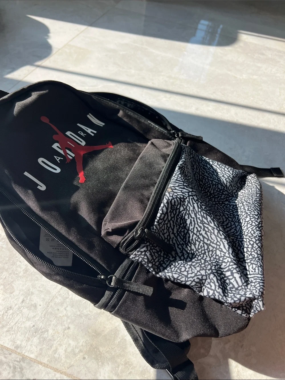 Jordan Air Backpack with Red Jumpman and Gray Pattern Pocket
